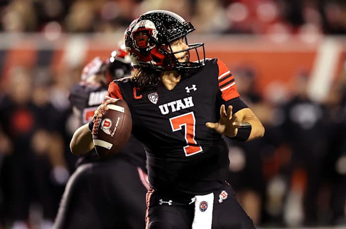 Utah Utes quarterback Cameron Rising (7) throws against the USC Trojans in the second half at Rice-Eccles Stadium.